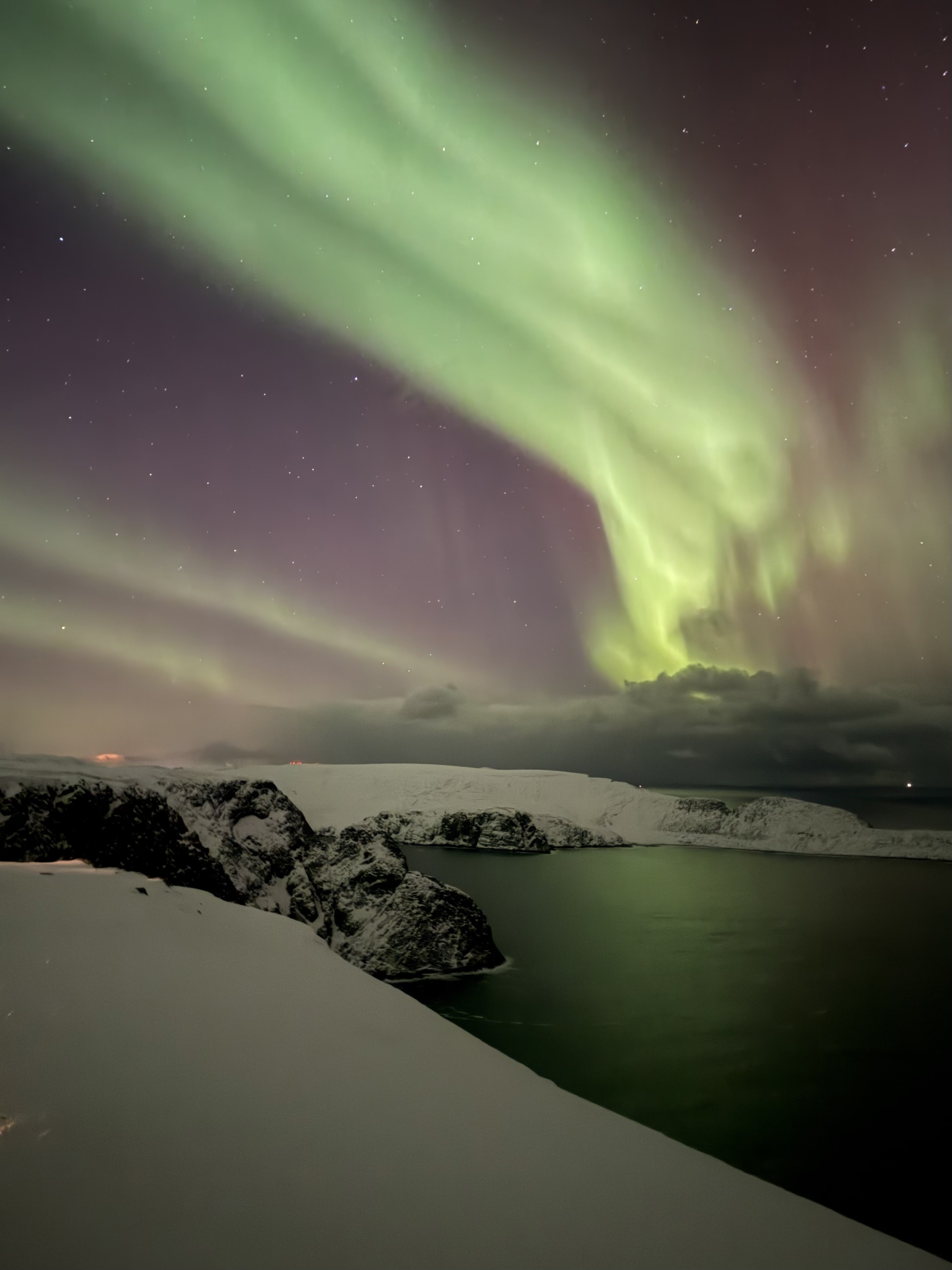 Northern lights over water